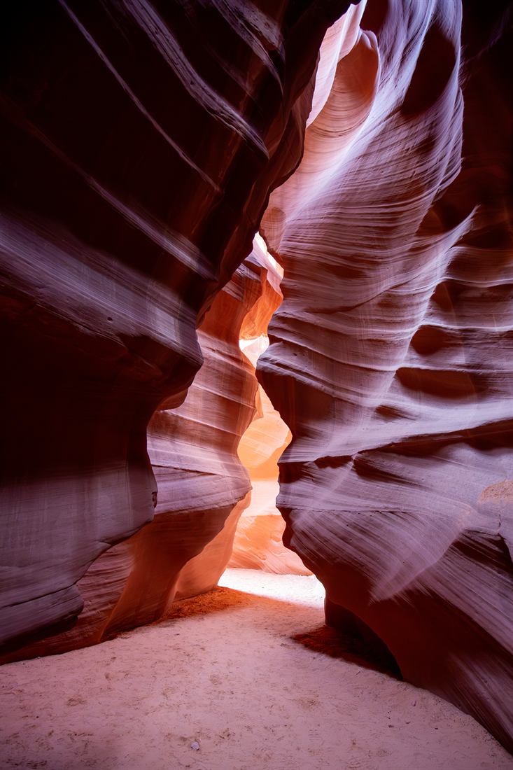 Warm light winding through the sculpted walls of Antelope Canyon